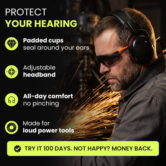 Man wearing the earmuffs and safety glasses while grinding steel